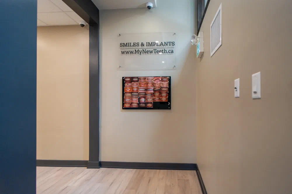 Smile and dental implant results display at Cookstown Dental Centre