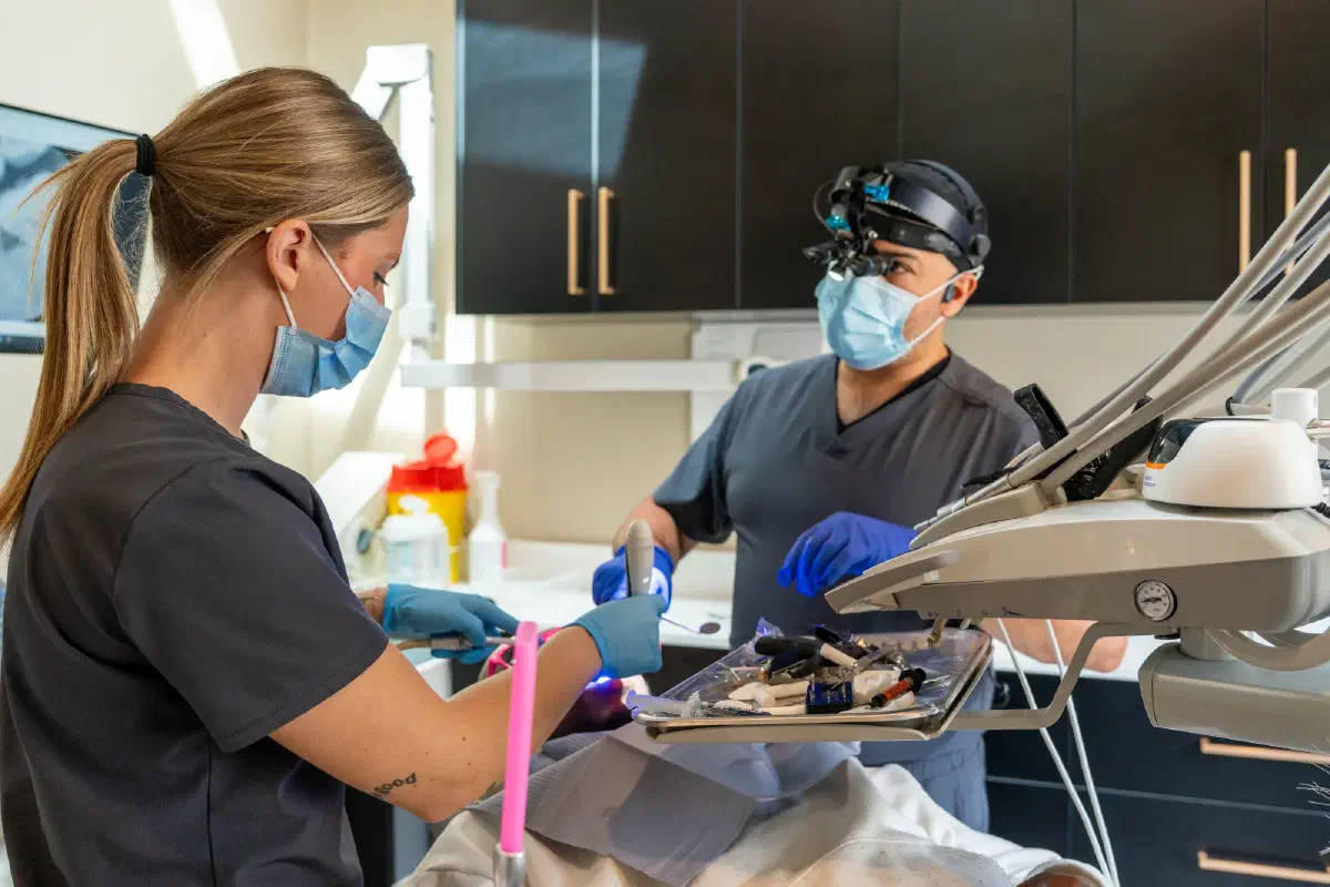A Cookstown Dental Centre dentist and dental assistant caring for a patient