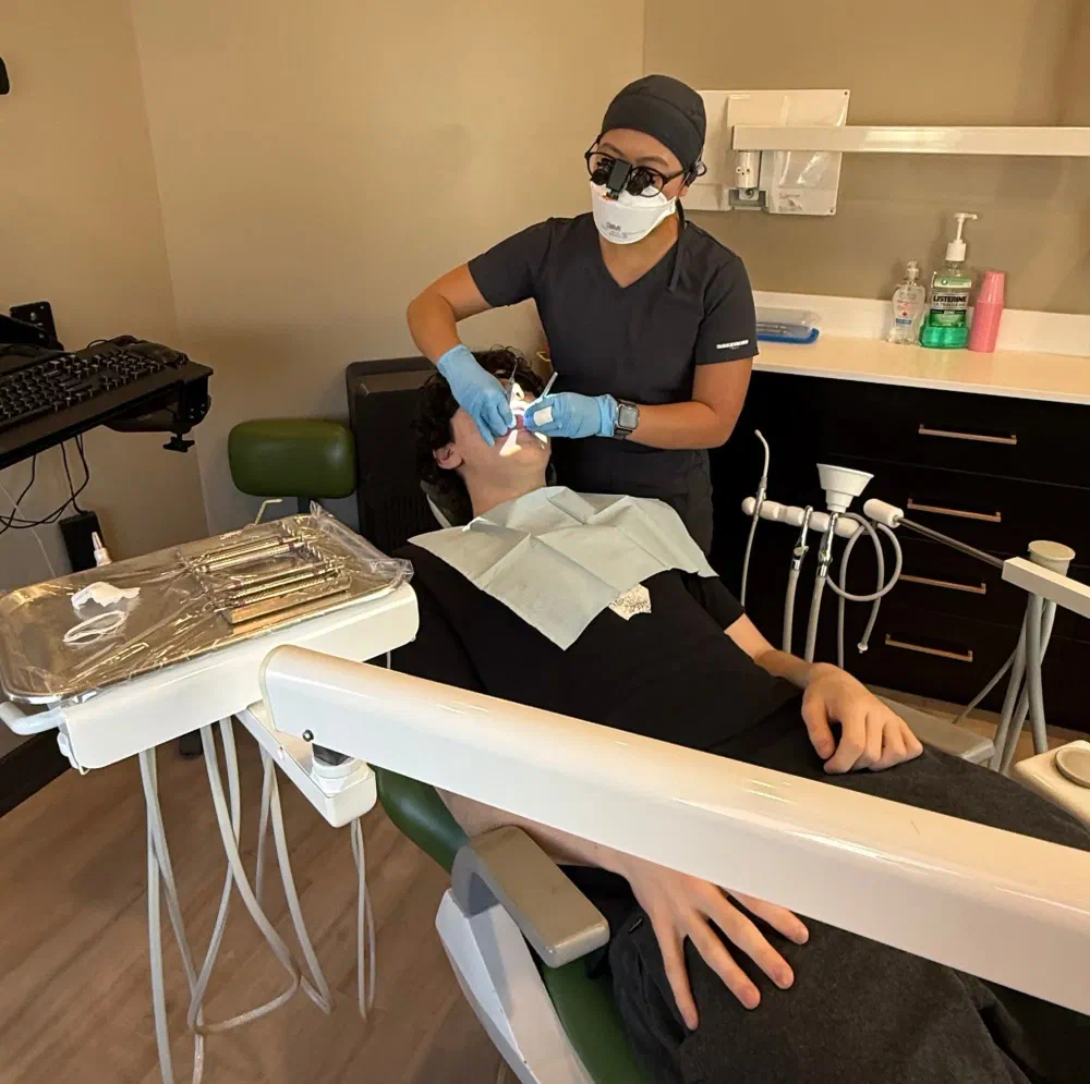 Dental hygienist providing a professional teeth cleaning at Cookstown Dental Centre