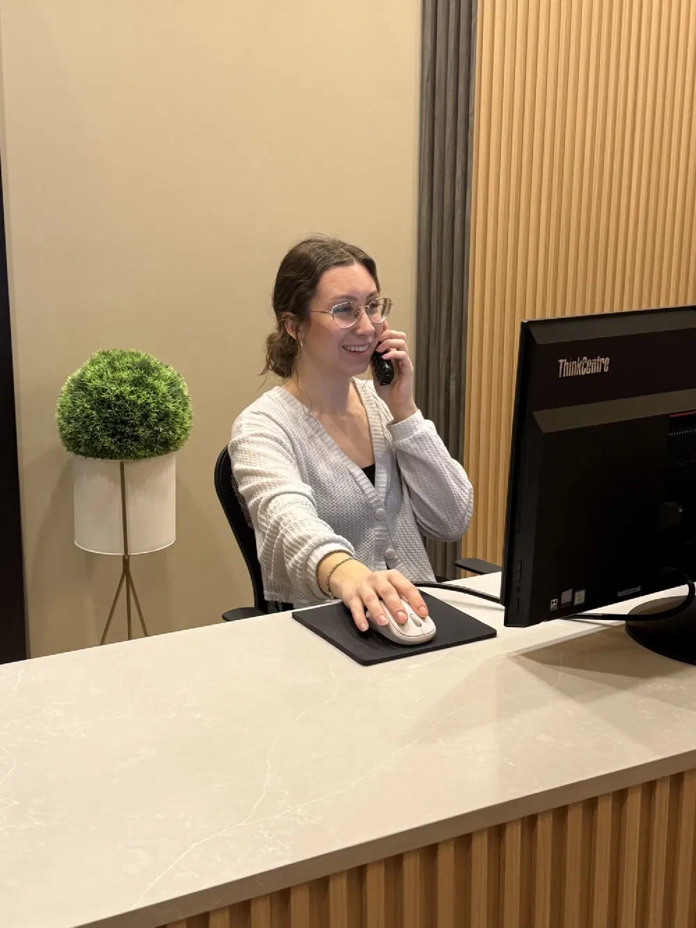 Cookstown Dental Centre receptionist helping a patient by phone