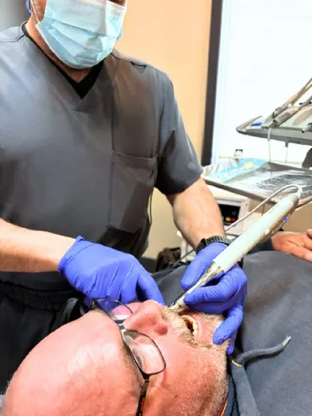 Cookstown dentist providing treatment with modern dental equipment