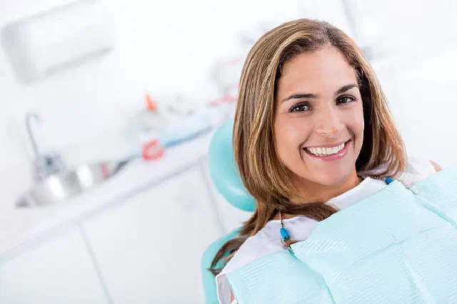 Patient discussing clear-aligner treatment during a dental consultation